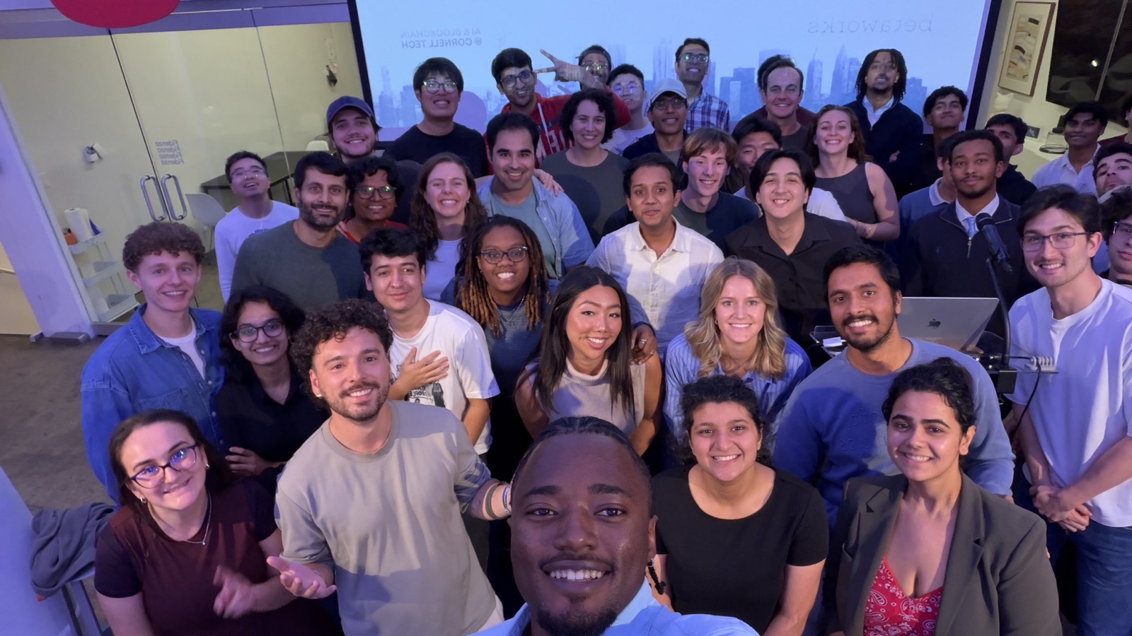 Hackathon participants and judges in a big group photo