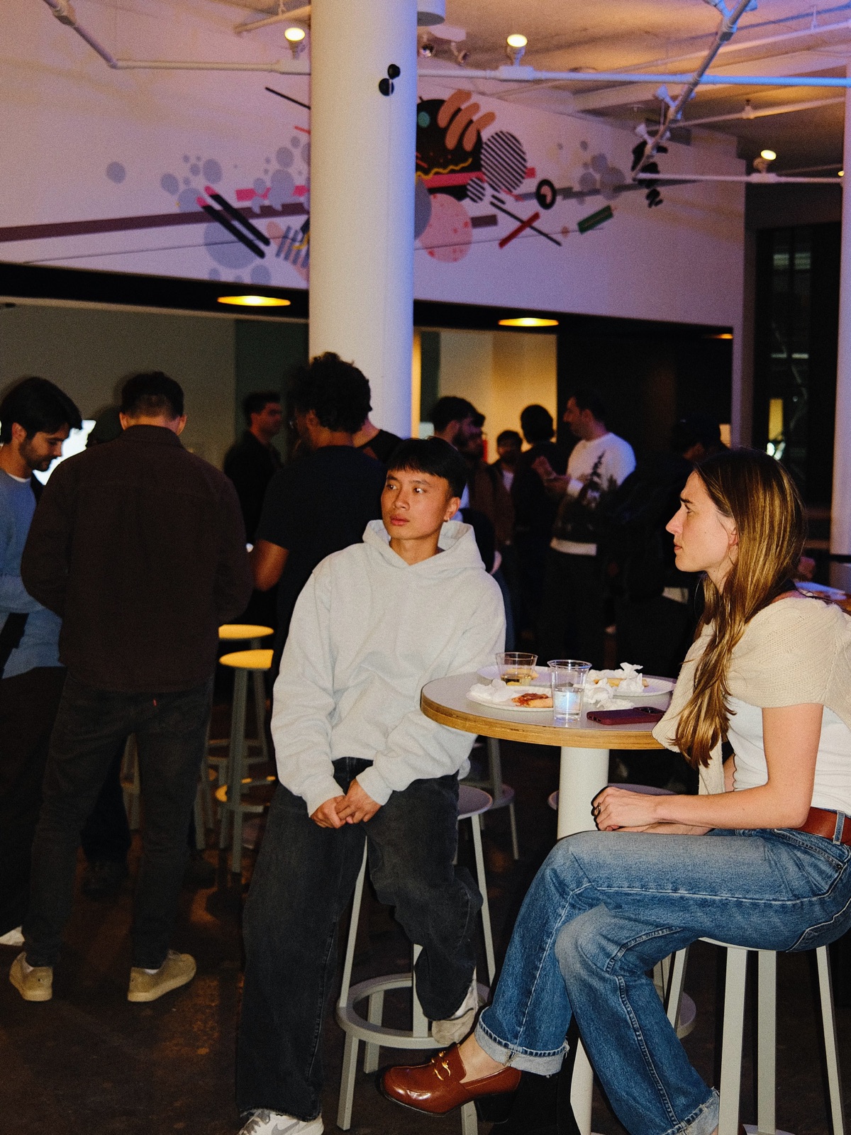 Guests at high tables in the Betaworks event space