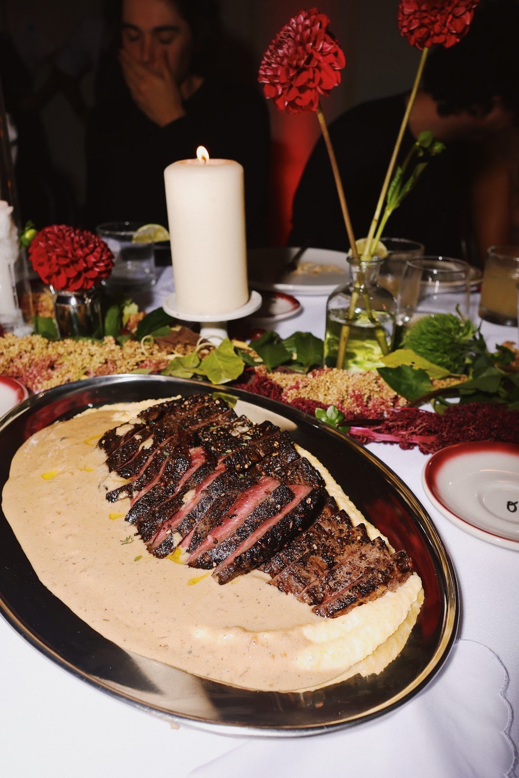 A plated steak on the dinner table